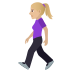 🚶🏼‍♀️ woman walking: medium-light skin tone display on JoyPixels